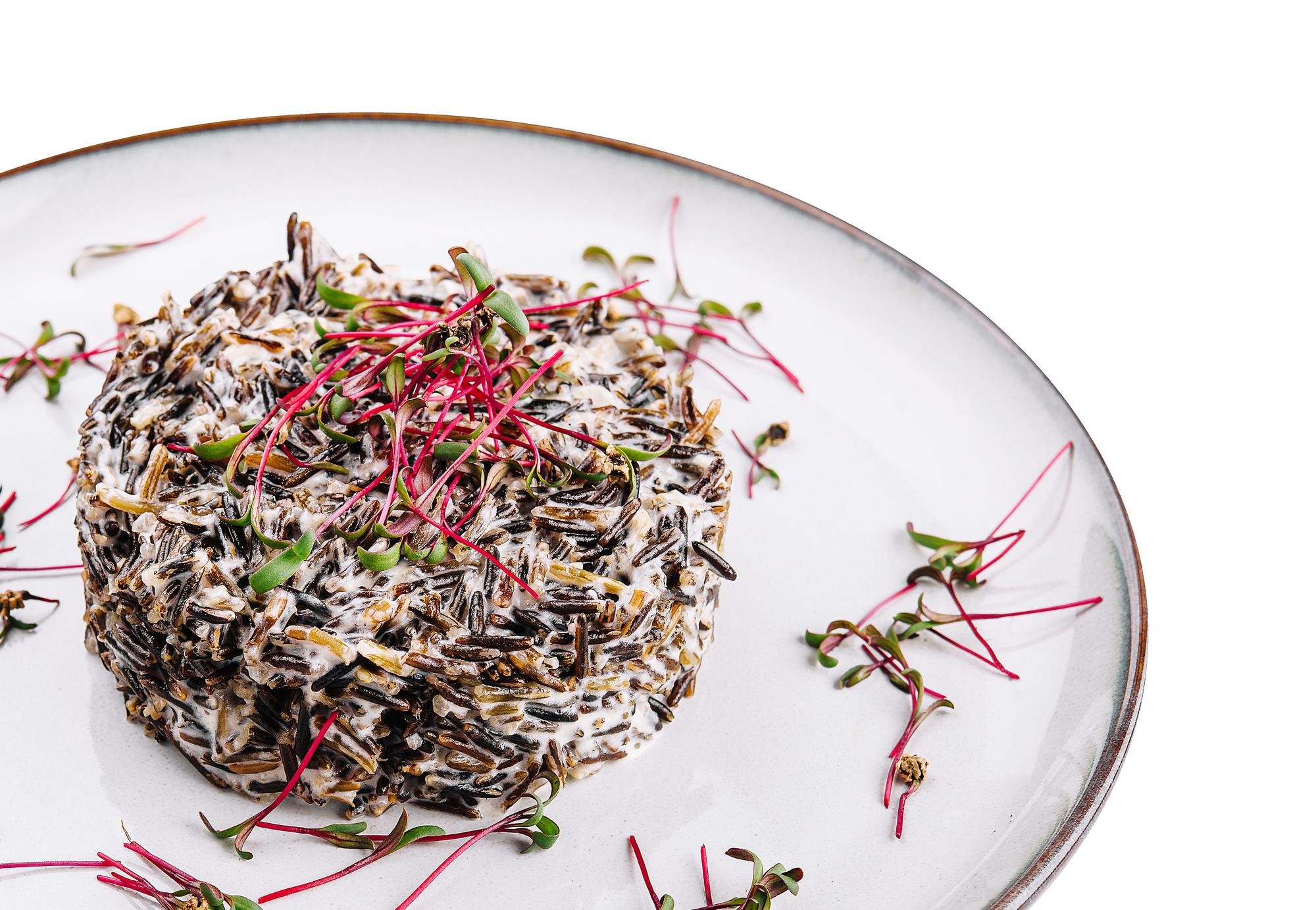 Plated dish close-up with microgreens